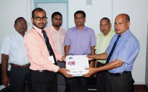 Handing over projector to AEC